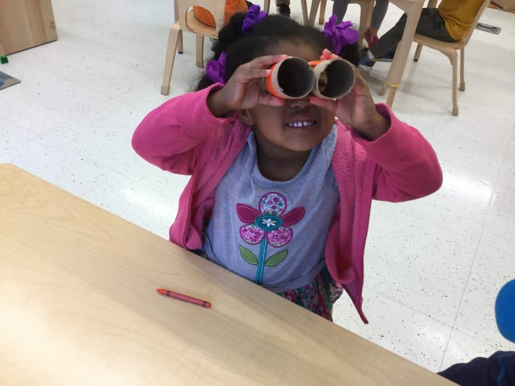 girl with binoculars