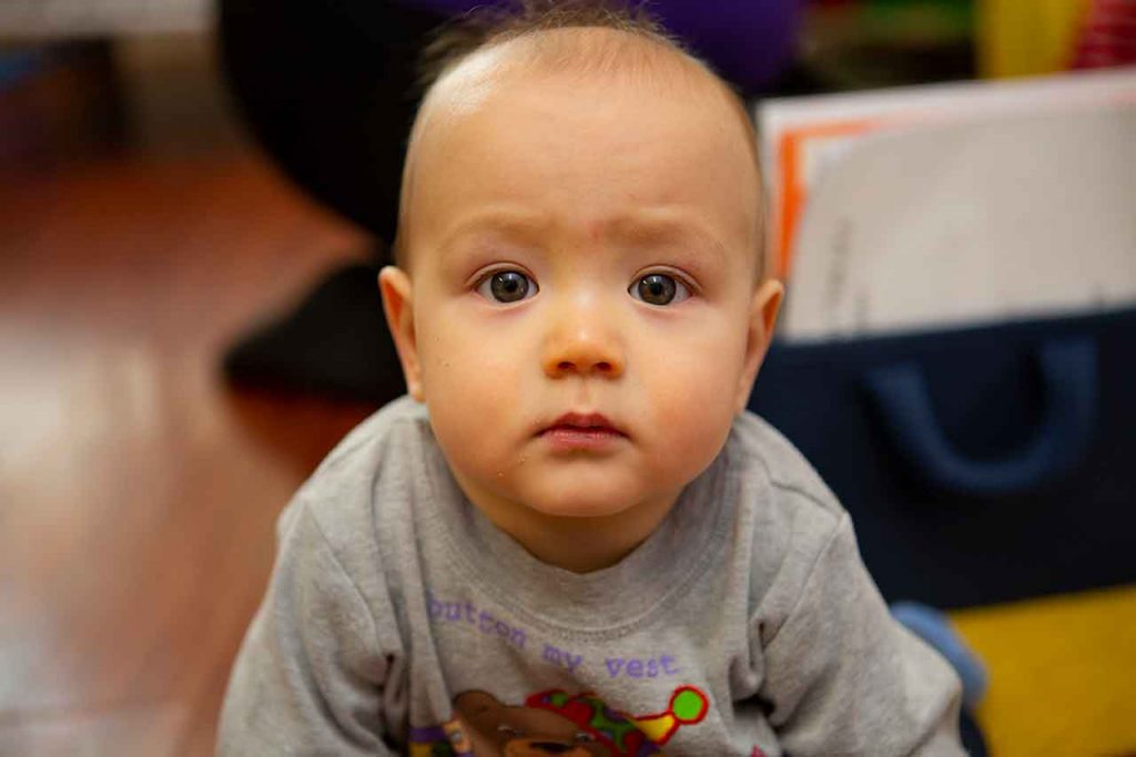 Infant looking at camera